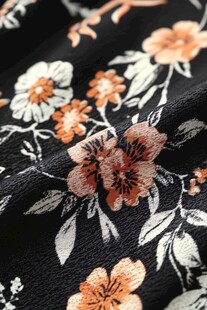 黑色底花卉图案布料