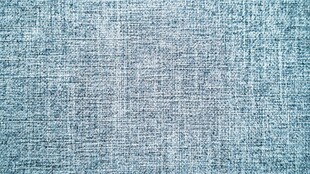浅蓝色麻布纹理背景图