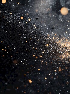 黑色背景上的金色闪光颗粒