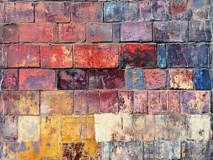 多彩斑驳砖墙纹理特写