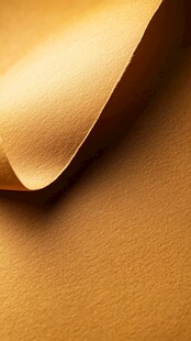 金色卷曲纸张质感特写