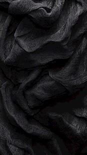黑色褶皱布料纹理特写