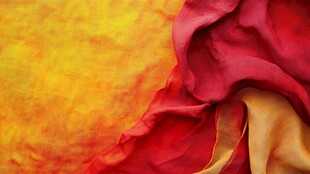 红黄绸布交织的绚丽纹理