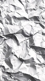皱巴巴的银色纸张纹理
