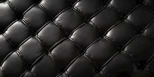 黑色菱格纹皮革纹理特写