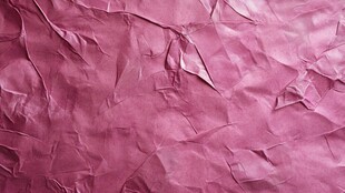 粉红色褶皱纸张纹理