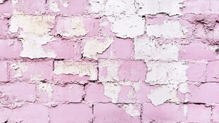 粉色斑驳砖墙纹理特写