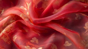 红色金纹丝绸的优雅纹理