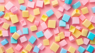 多彩糖果方块散落背景