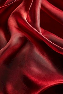 红色绸缎的优雅褶皱纹理