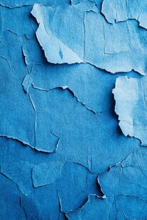 蓝色剥落墙面纹理特写