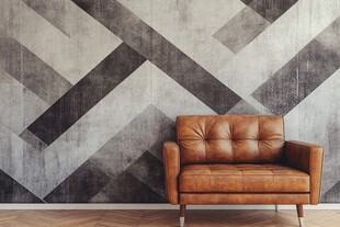 几何墙前的复古棕色皮沙发