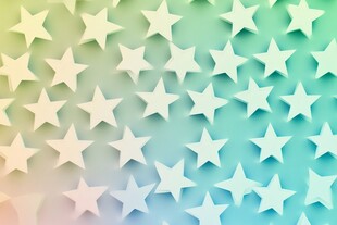 梦幻渐变背景上的立体星星