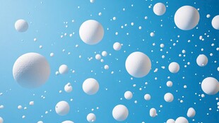 蓝色背景下的白色悬浮球体