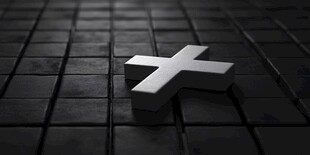 黑色背景上的立体白色十字