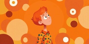 橙色背景下的俏皮红发男孩