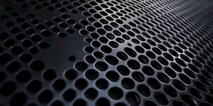 金属穿孔纹理背景特写