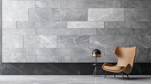 灰色大理石墙前的休闲座椅