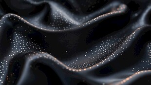 黑色绸缎上的闪耀微粒