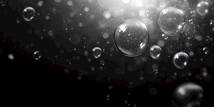 梦幻黑背景下的透明气泡