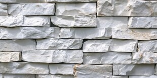 灰白石砌墙面纹理特写
