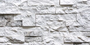 灰白石砌墙面纹理特写