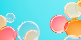 彩色气泡在蓝背景中漂浮