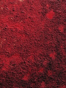 红色斑驳墙面纹理特写