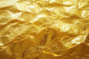 金色褶皱箔纸纹理特写