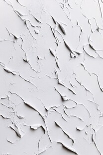 白色裂纹墙面纹理特写