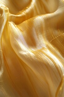 金黄绸缎的优雅褶皱纹理