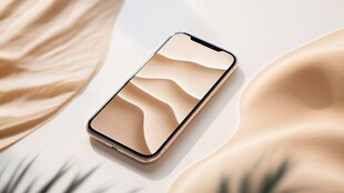 金色手机与叶片创意展示