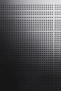 黑色金属穿孔纹理背景