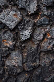 粗糙嶙峋的黑色岩石纹理